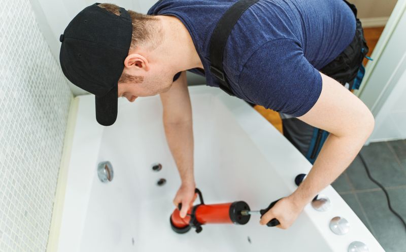 Plumber Setting Up Fixtures